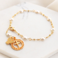 Schmucksets Machen Sie trendigen Schmuck mit religiösen Symbolen