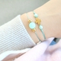 Schmuck in mintgr&uuml;nen T&ouml;nen von Polaris Elements Perlen mit goldenen Details 