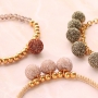 Festliche Armb&auml;nder mit neuen glitzernden Pompoms