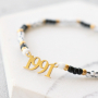Sie k&ouml;nnen diesen Schmuck mit den neuen Stainless Steel Jahreszahlen Zwischenst&uuml;cken herstellen: