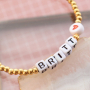 Sehen Sie hier, wie Sie den sch&ouml;nsten personalisierten Schmuck selbst herstellen k&ouml;nnen:
