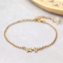 Trendige Ohrringe und Armb&auml;nder mit Zirkonia Anh&auml;nger und Zwischenst&uuml;cke: