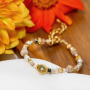 Erstellen Sie personalisierte Armb&auml;nder mit Geburtsblumenperlen