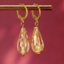 Entwerfen Sie trendigen Schmuck mit Polaris Elements Cabochons und Perlen