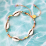 Lassen Sie sich zu sommerlichem Schmuck mit Kaurimuscheln inspirieren
