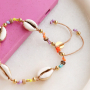 Lassen Sie sich zu sommerlichem Schmuck mit Kaurimuscheln inspirieren