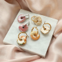 Kreativ sein mit griechischen Donut Keramikperlen