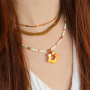 Schmuckdesigns mit griechische Blumenperlen aus DQ-Keramik
