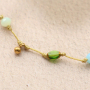 So wird aus ovalen Glasperlen mit goldfarbenem Rand schicker Schmuck 