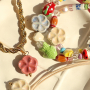 Satementschmuck mit Schmuckdesigns mit griechischen DQ-Keramikperlen in Bl&uuml;tenform 