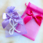 Geschenke einzigartig mit Organzas&auml;ckchen und bef&uuml;llbare Kunststoff-Formen verpacken