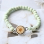 Mit unseren Holz Perlen in frischen Farben machen Sie diesen sch&ouml;nen Schmuck mit herrlichen Details